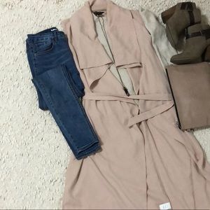 Revamped long sleeveless buttonless kimono vest